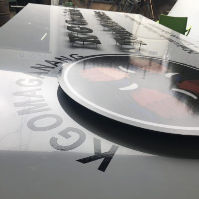 Vinyl applied to cut-out I-bond standing proud